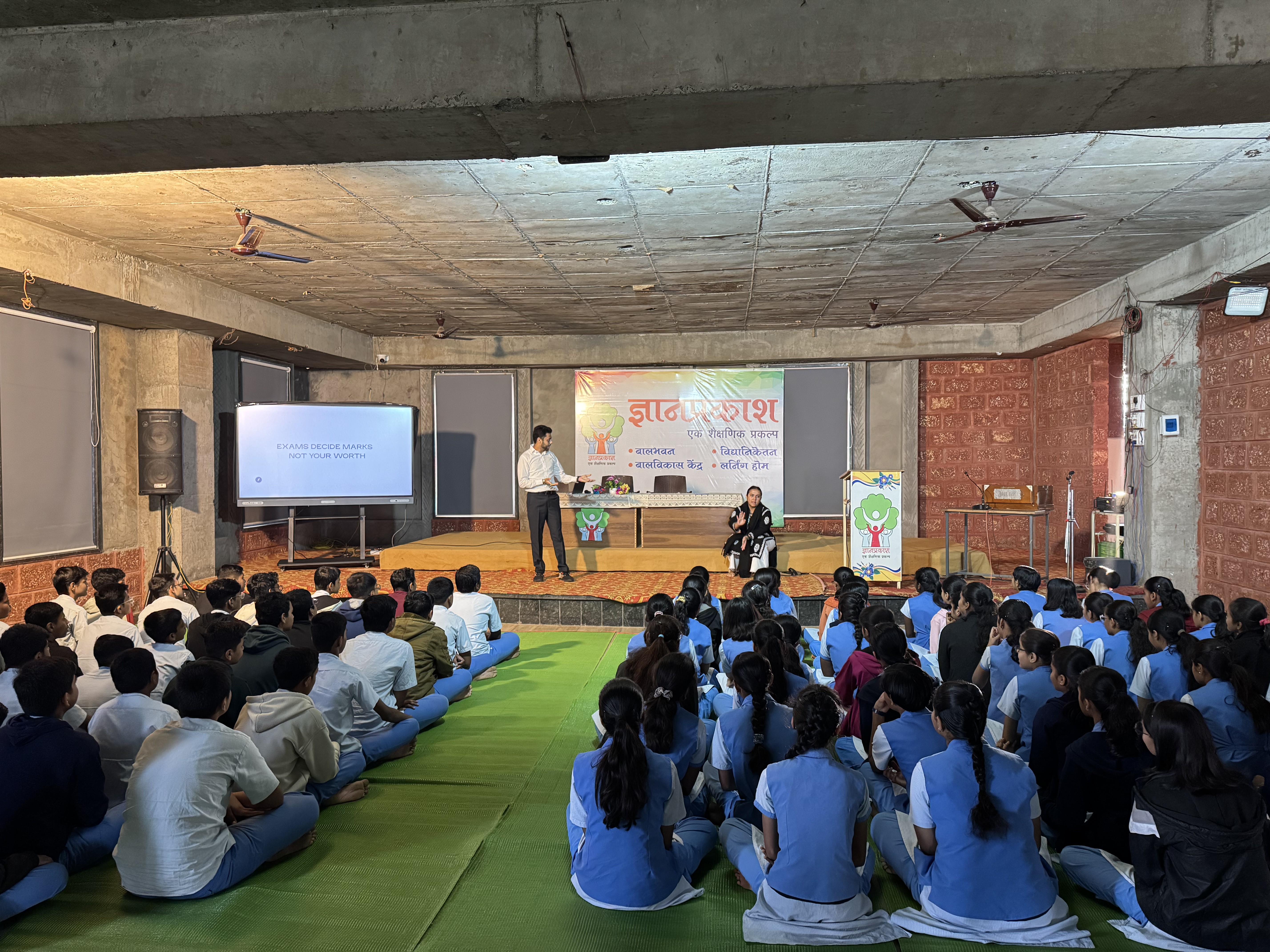 Neha and Hriday leading a session together at Dnyan Prakash School, Latur