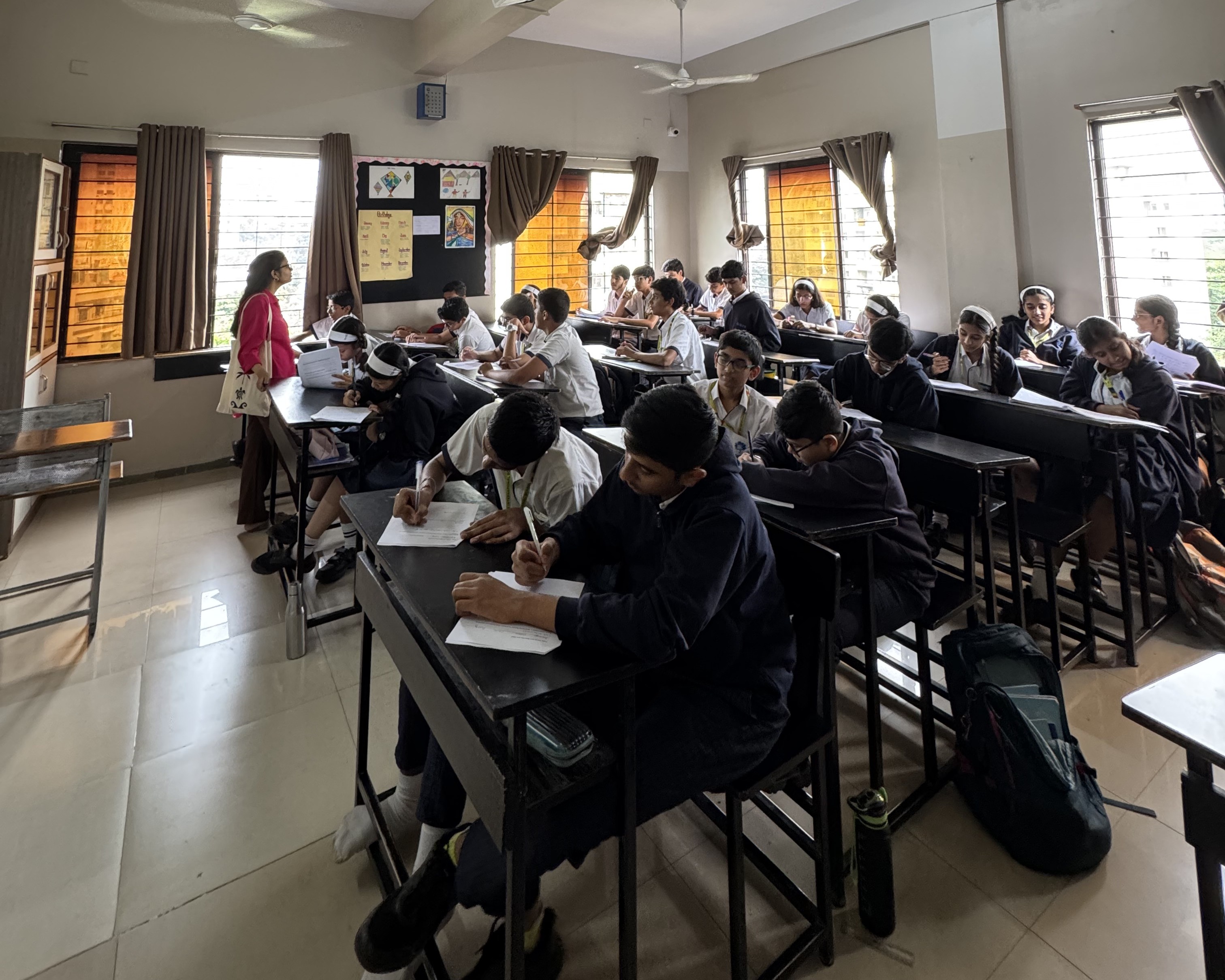 A student writing honestly during the Discovery Session survey