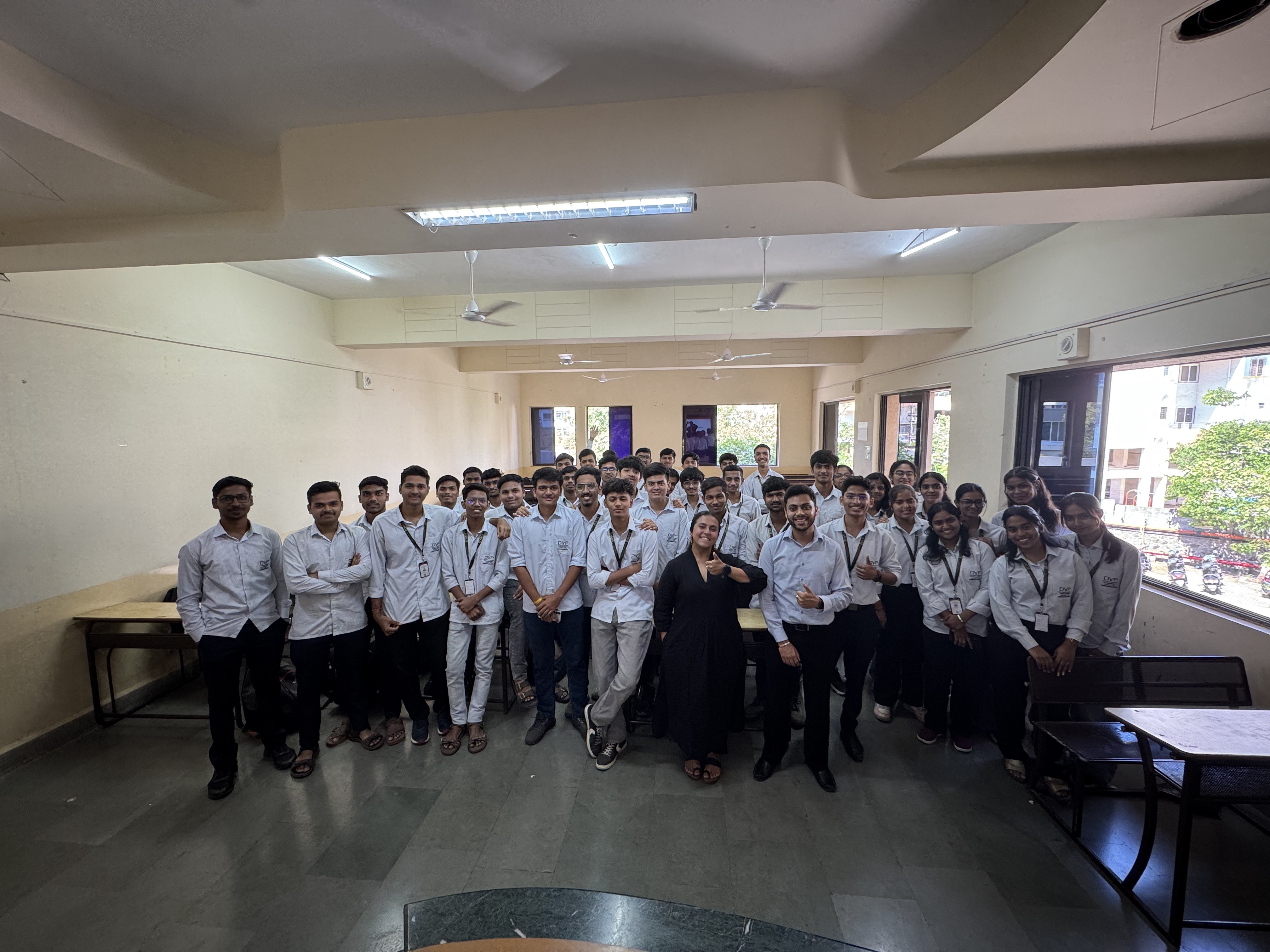 Students seated in the DY Patil College auditorium during a session